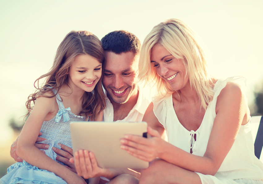 happy family with tablet pc taking picture